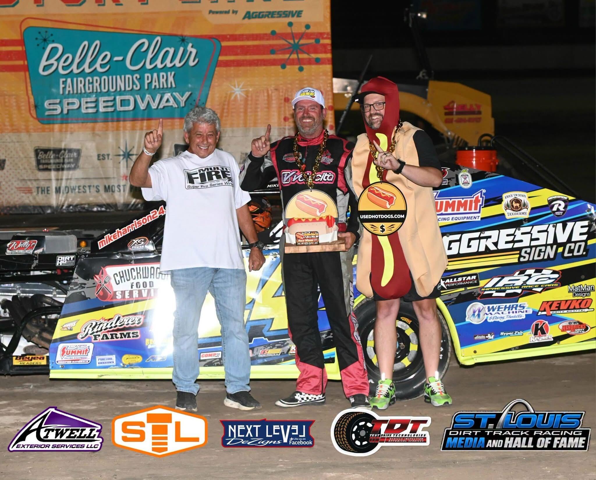Race night at Belle-Clair with a hot dog trophy and our founder in costume