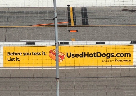 UsedHotDogs.com wall sign at World Wide Technology Raceway