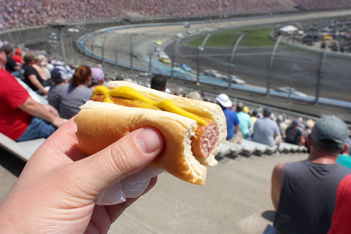 POV of a mustard hot dog overlooking the racetrack